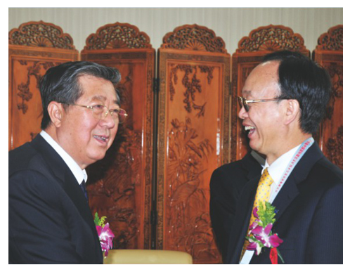 2011年9月中国煤炭工业协会会长王显政会见石华辉董事长